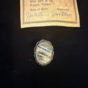 ancient roman glass brooch from the Holy Land.  Part of the Roman Empire